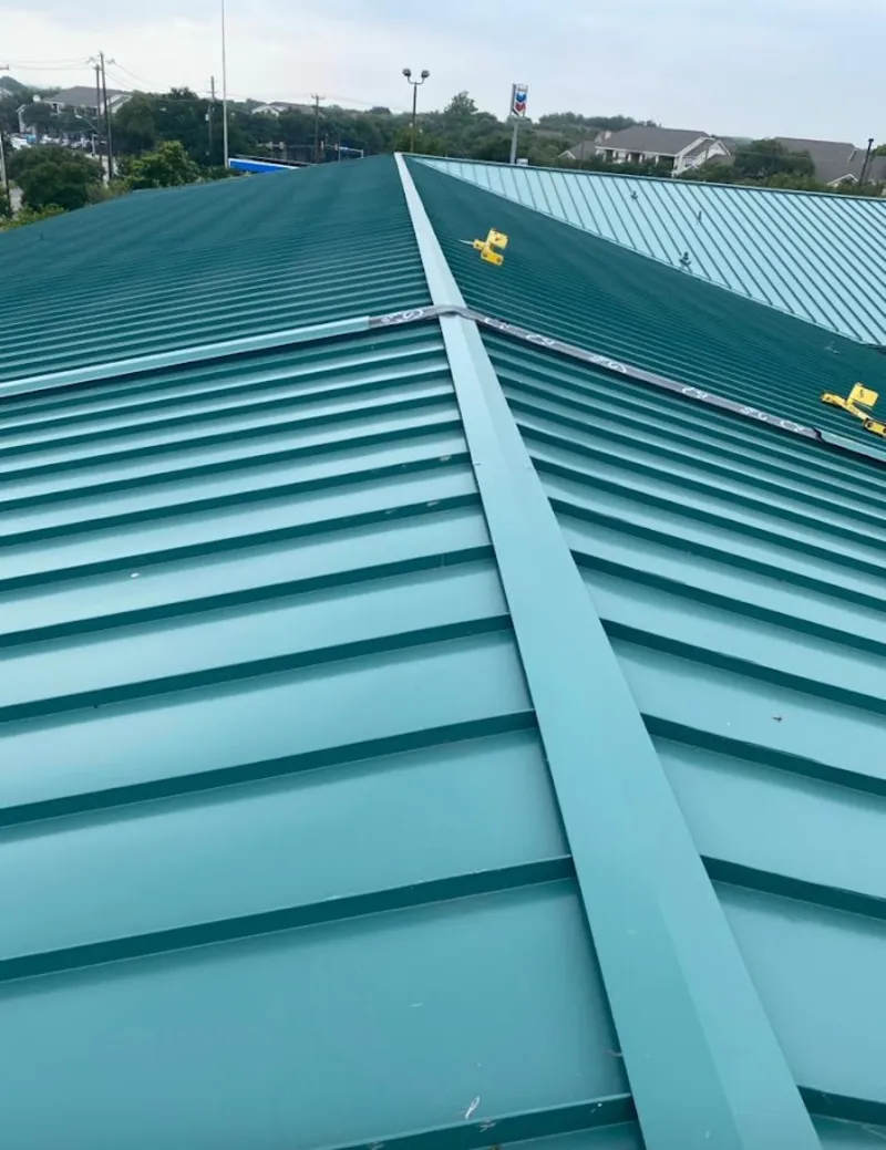 Green commercial metal roof ridge and valley for Metal Roof Repair in Midlothian