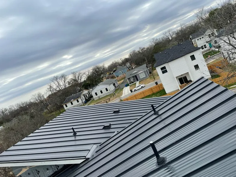 Standing seam metal roof panels with vents for Skylight Repair in Midlothian